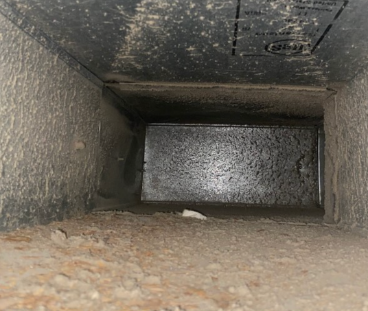 Dirty air duct before cleaning